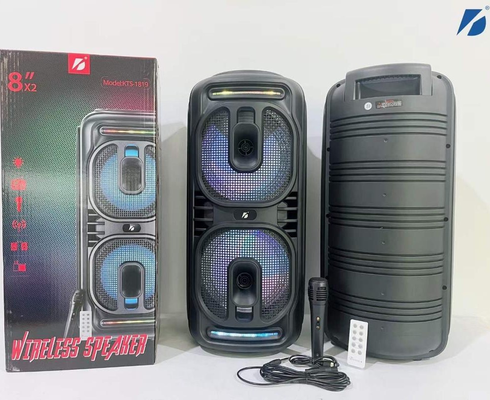 اسپیکر چمدانی رم و فلش خور KTS-1819 + میکروفون و ریموت کنترل ا KTS-1819 Wireless Speaker