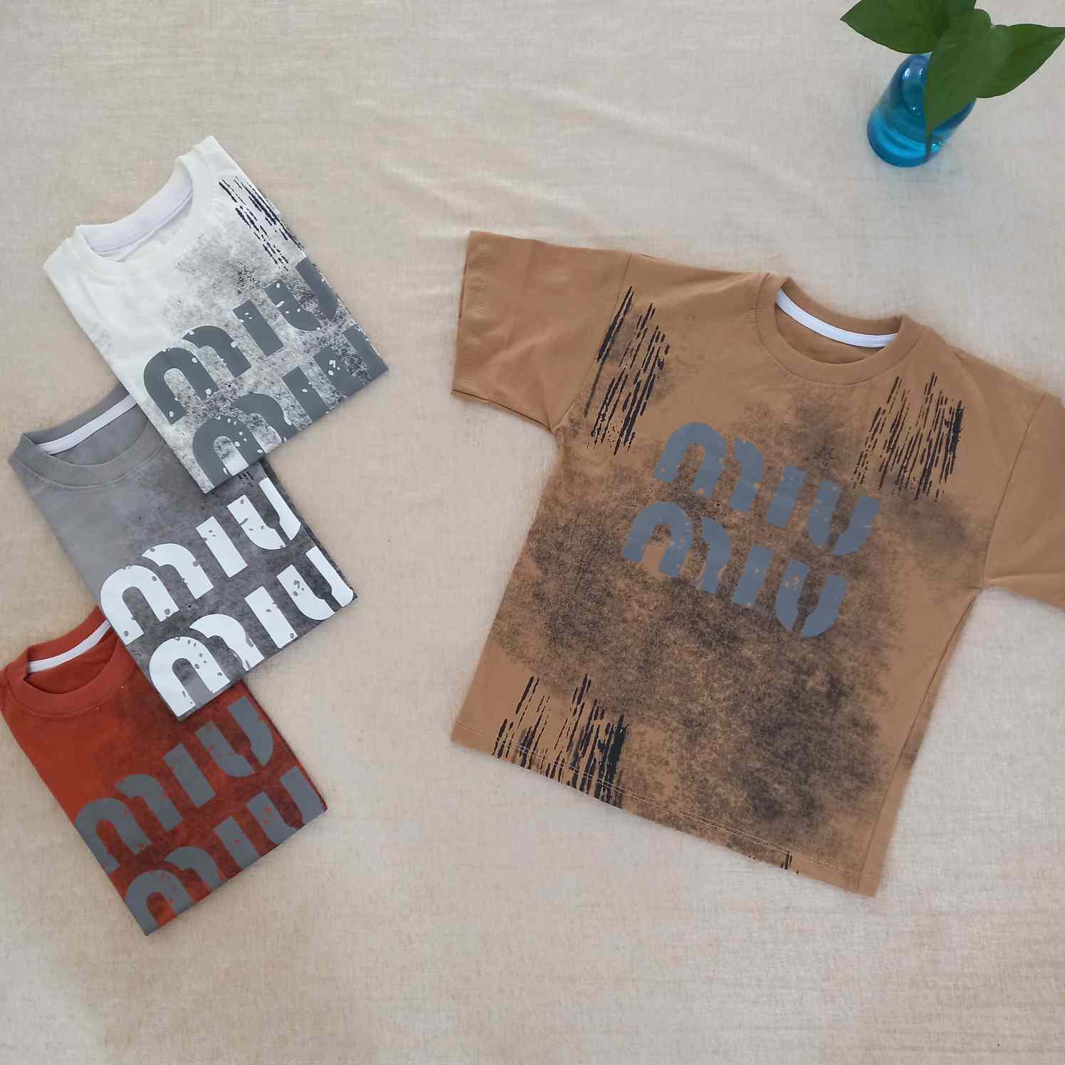 تیشرت پسرانه باکسی MIU MIU سایز50تا65 کد 2002039