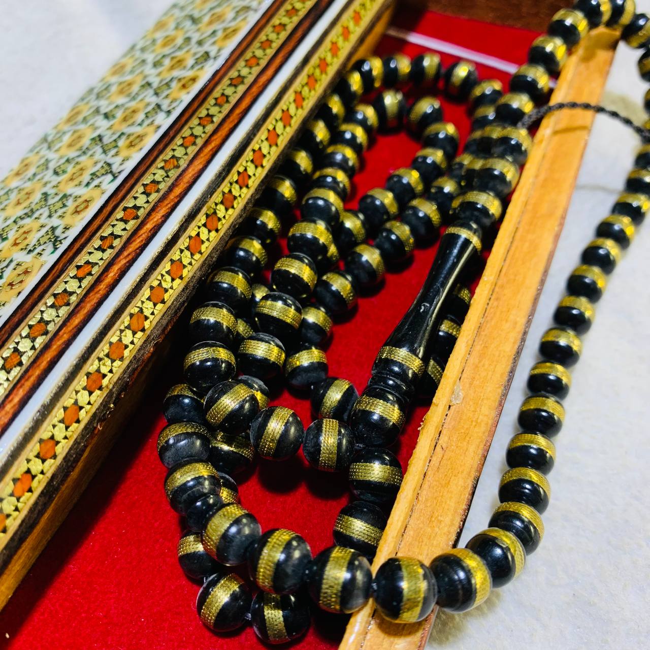 تسبیح کوک 101 دانه طرح طلاکوب