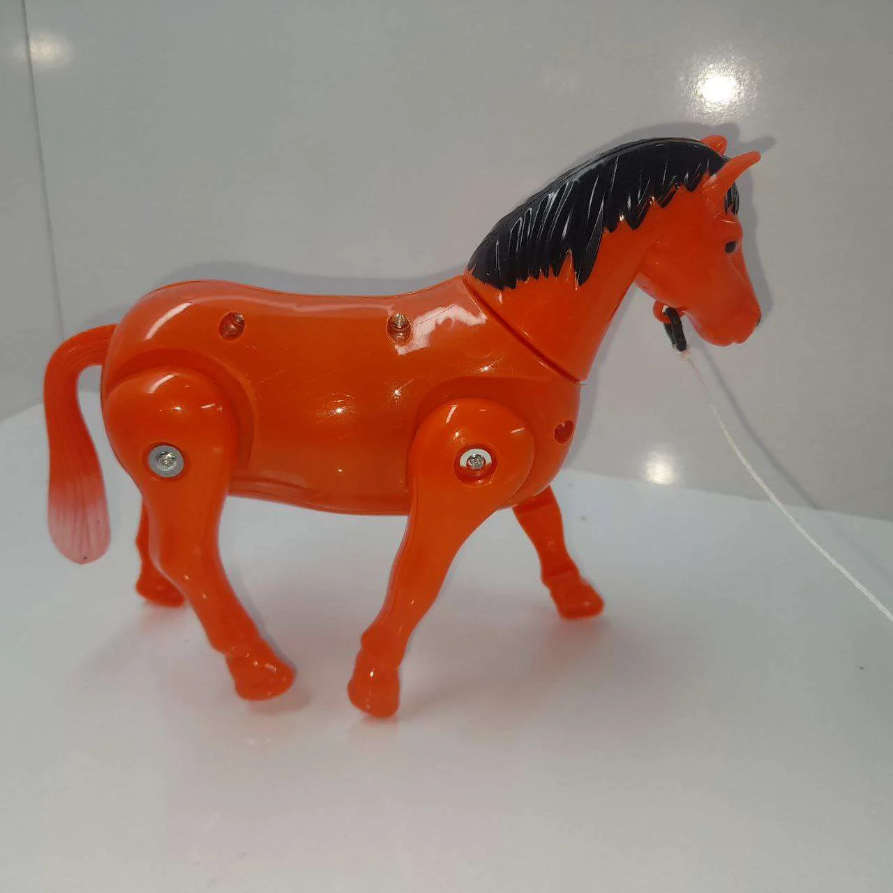 اسباب بازی اسب باتری خور گردان و چرخشی