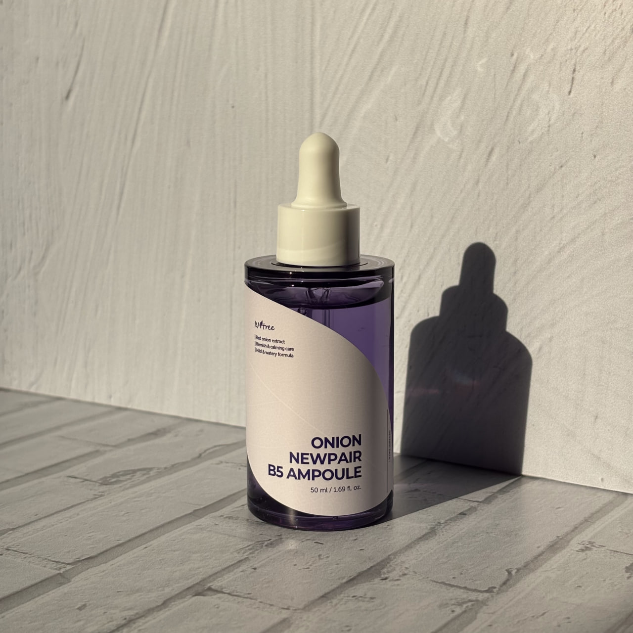 آمپول ضد لک و روشن کننده پیاز بنفش ایزنتری 50 میل ISNTREE Onion Newpair B5 Ampoule