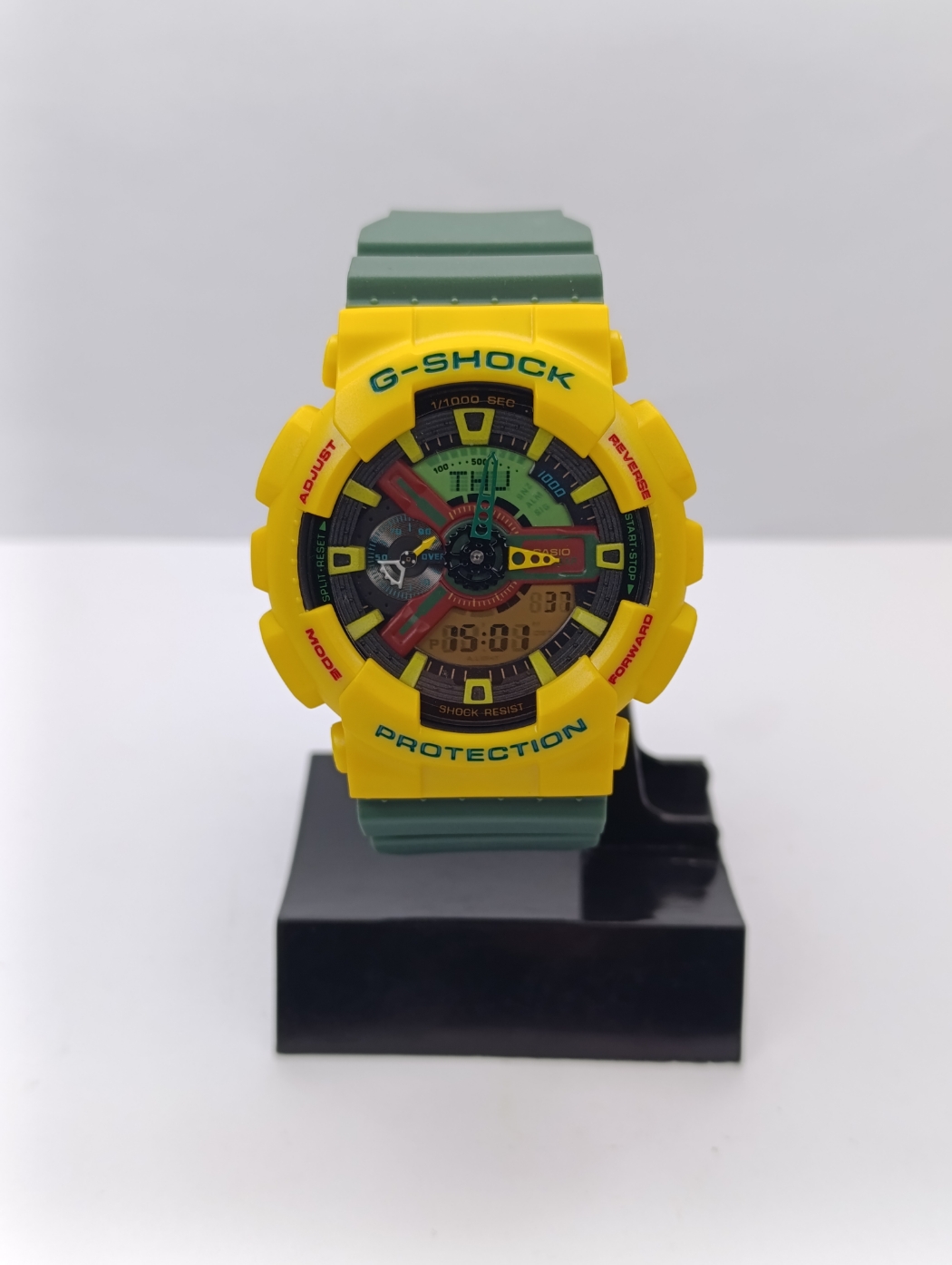 ساعت مردانه جی شاک قاب زرد بند سبز مدل G-SHOCK ga-110