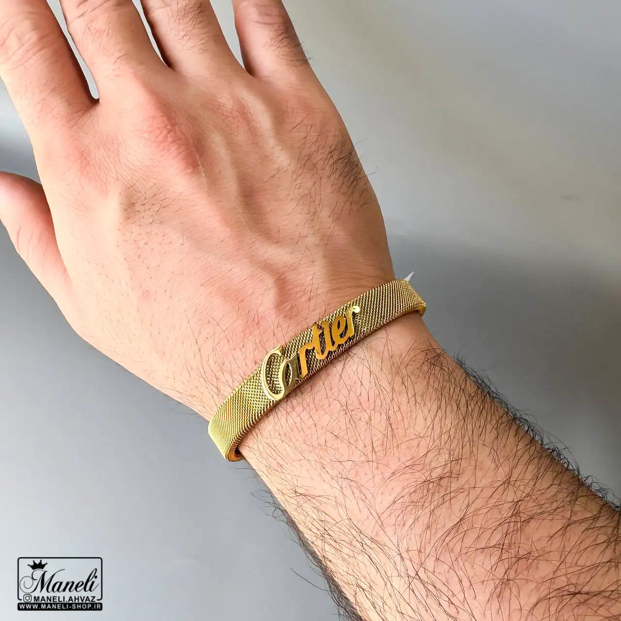 بنگل حصیری مردانه رنگ طلایی با نوشته Cartier - استیل 14031243