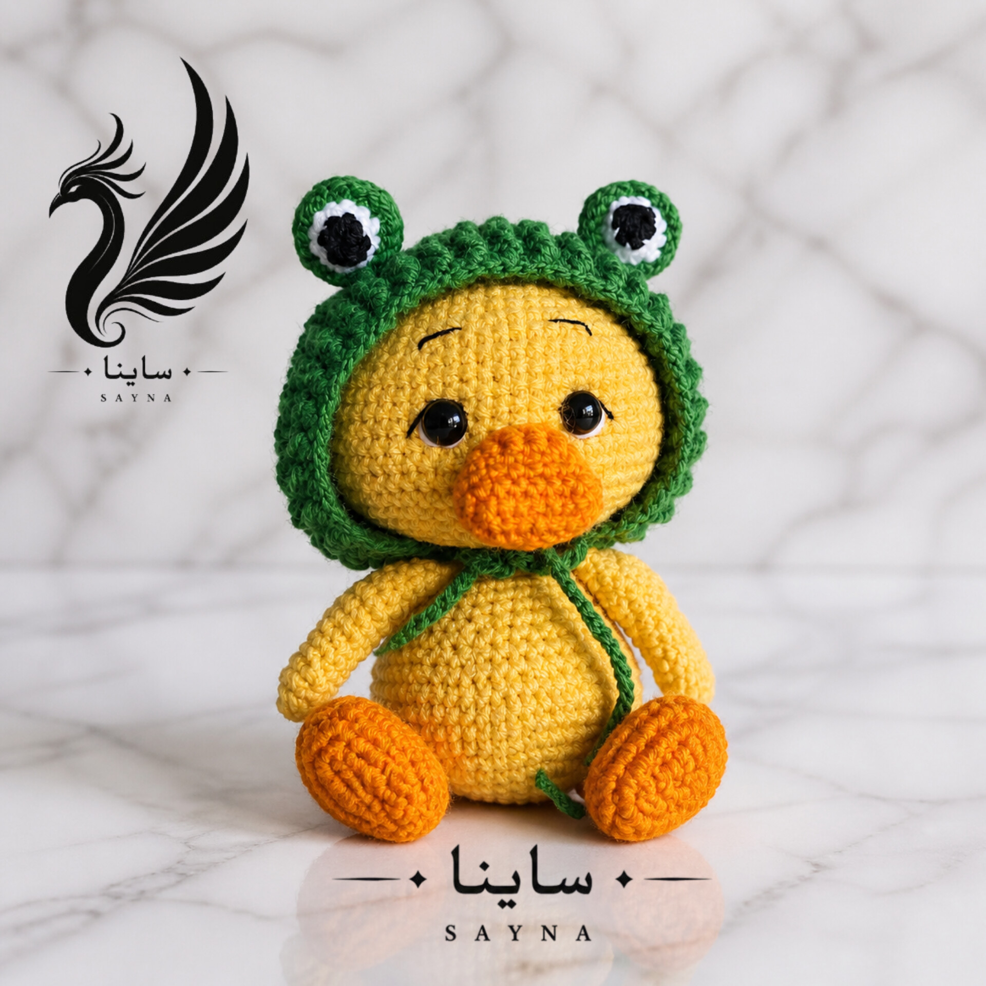 عروسک اردک کلاه قورباغه ای