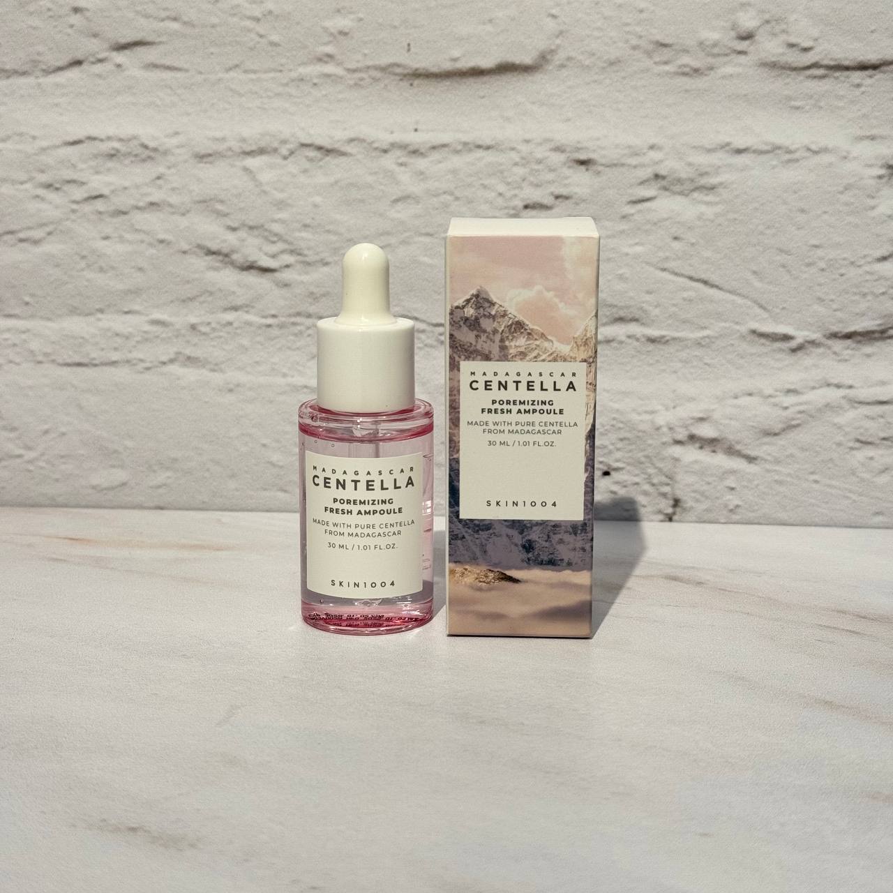 آمپول کنترل و کوچک کننده منافذ سنتلا ماداگاسکار اسکین 1004 30 میل SKIN1004 Madagascar Poremizing Fresh Ampoule
