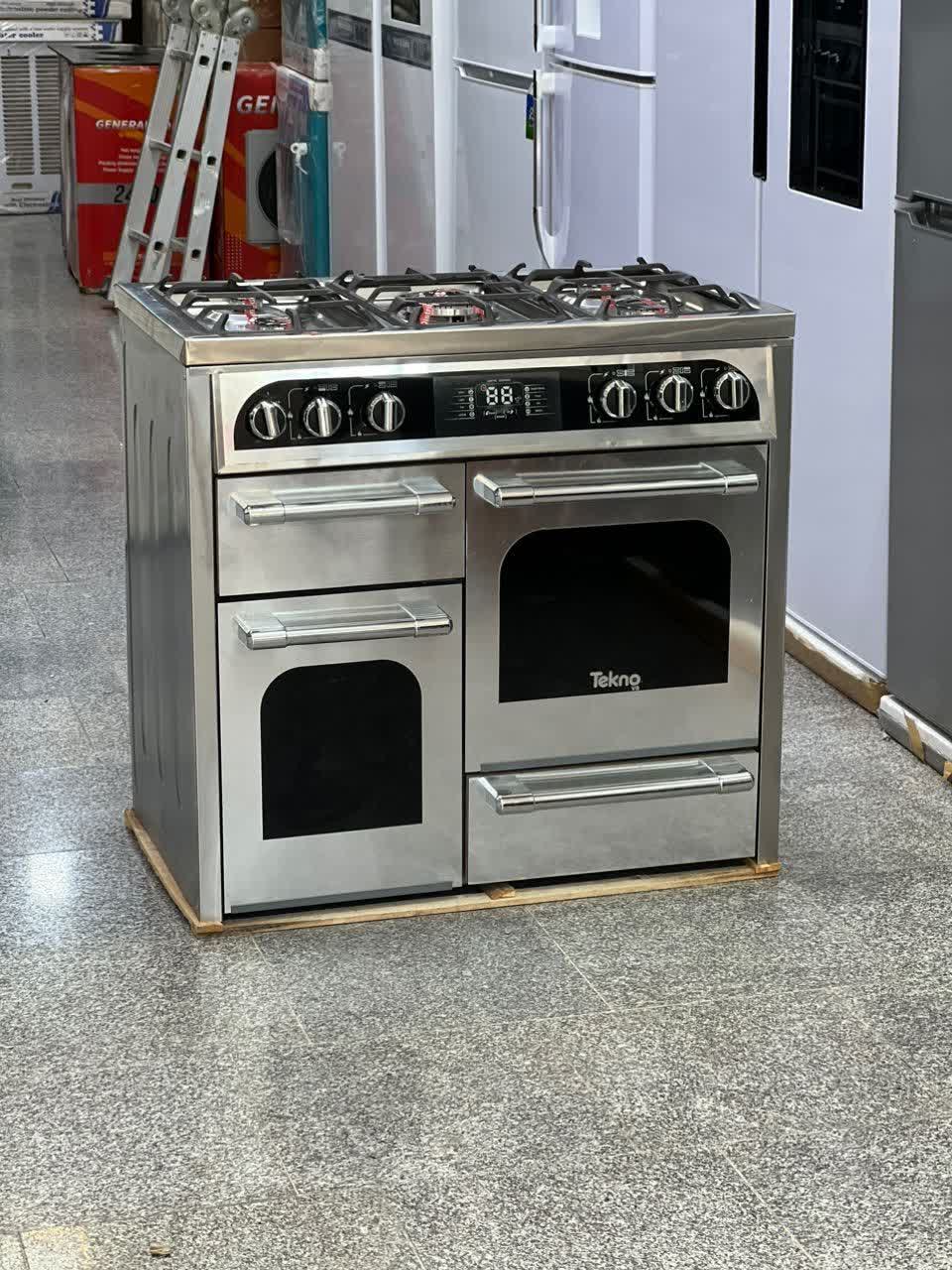 اجاق گاز طرح فر پنج شعله تکنو وا طرح چهار درب رویه استیل