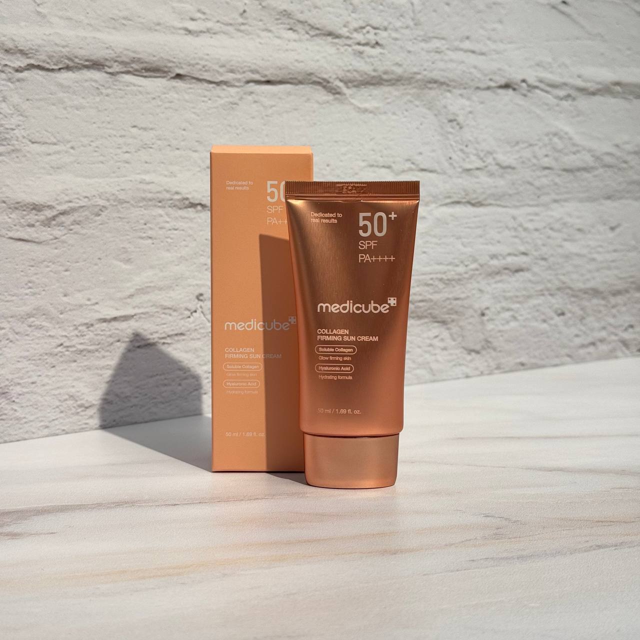 کرم ضد آفتاب تون آپ کلاژن مدی کیوب ضد چروک و روشن کننده پوست MEDICUBE Collagen Firming Sun Cream