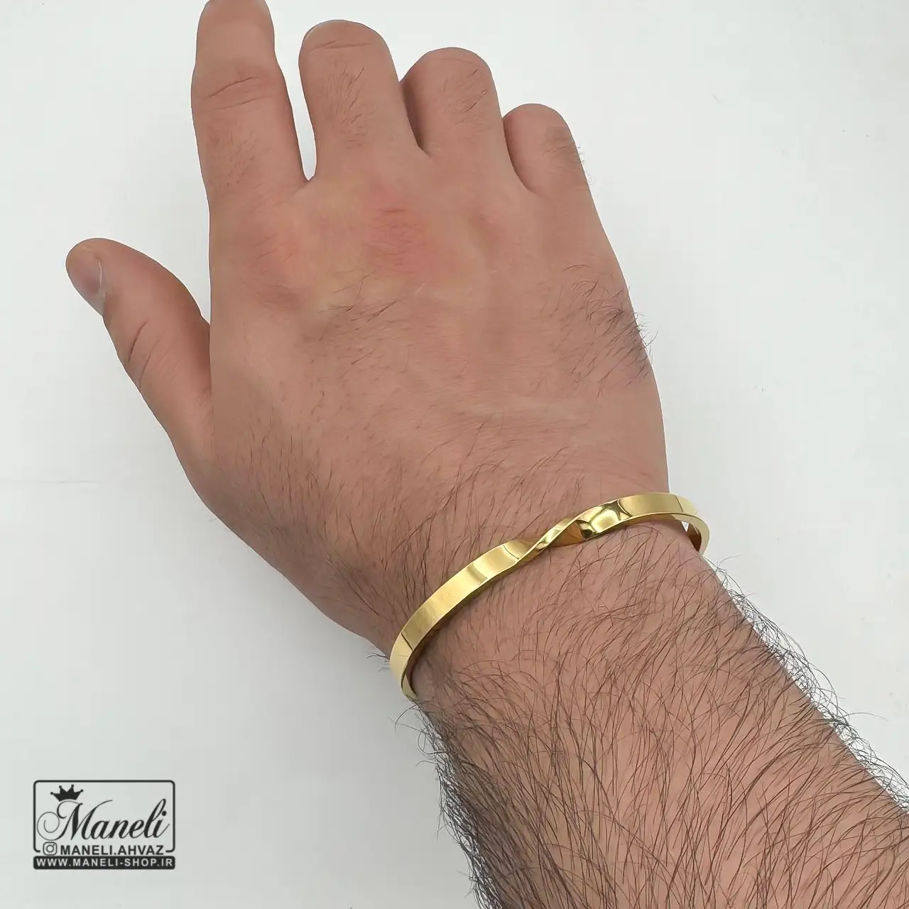 دستبند بنگل مردانه پیچی طلایی
